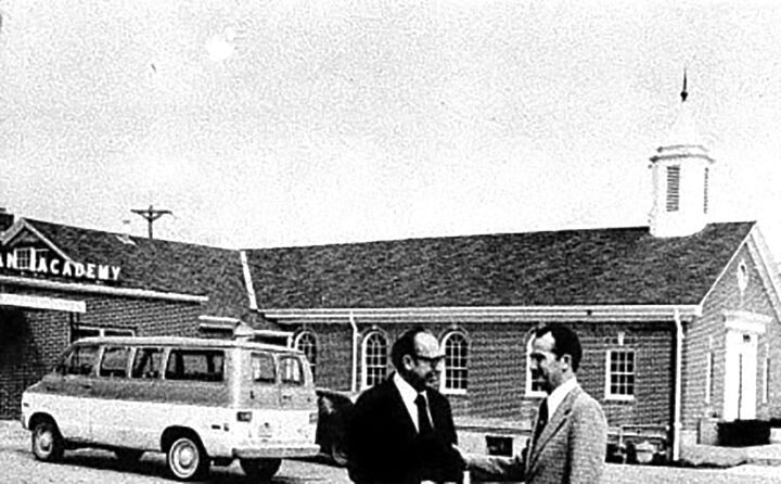 The Rev. Gene Casey, left, and the Rev. Henry Roberts in front of the new Twin City Christian Academy in 1974.